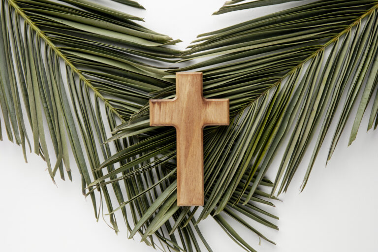 Top view wooden cross leaves - Palm Sunday