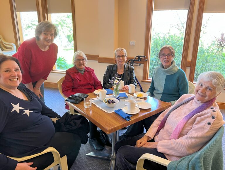 Rev'd Tracey and 5 community members enjoying morning tea
